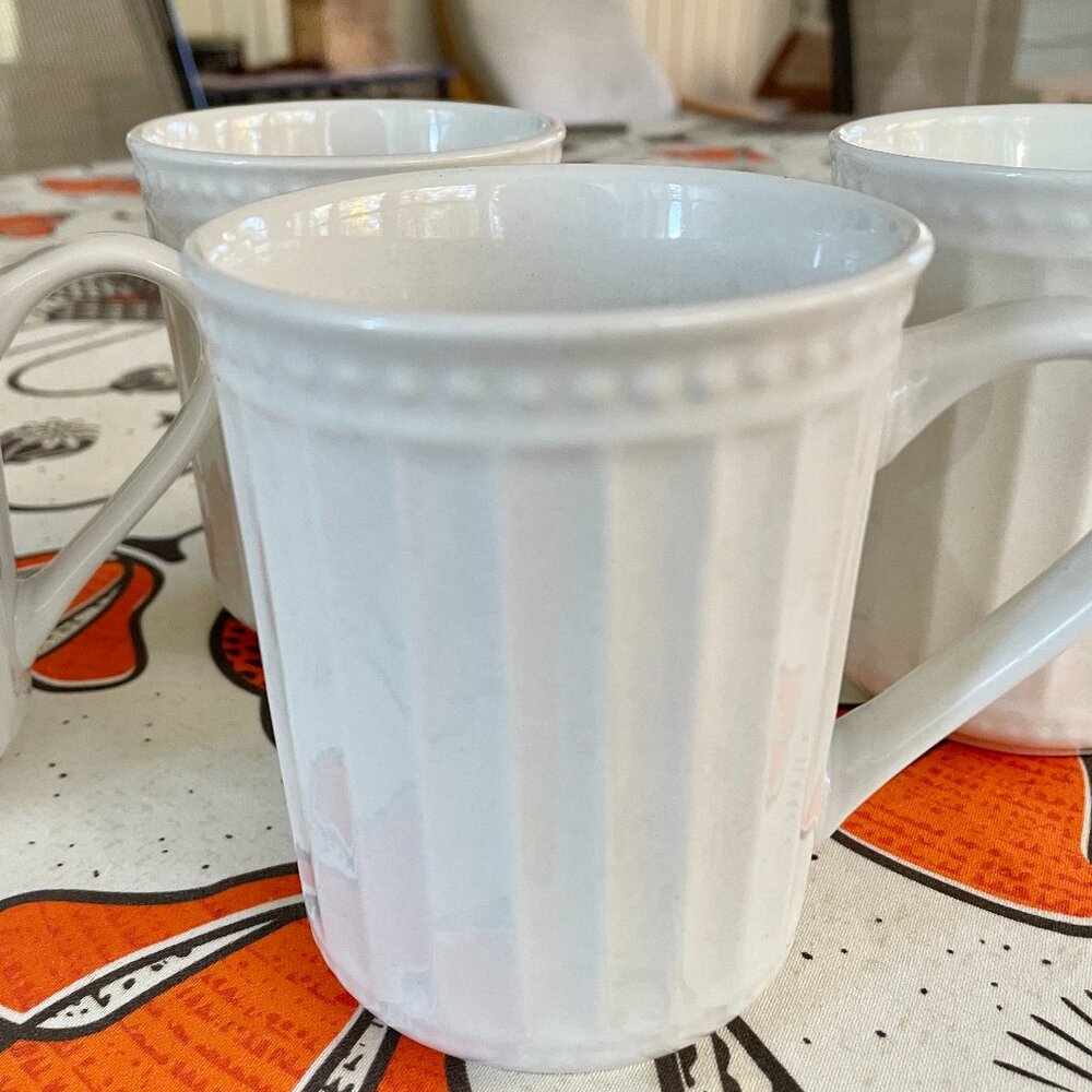 4 elegant mugs, like new